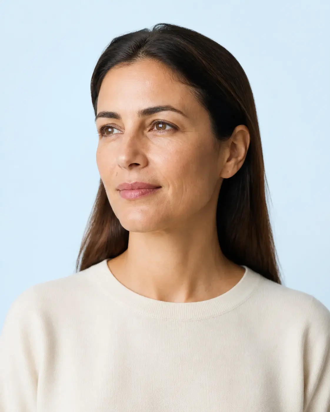 Three-quarter portrait of a woman with subtle illustrative markers for three facial regions
